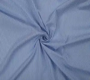 Bawełna koszulowa w paski - niebieskie tło 